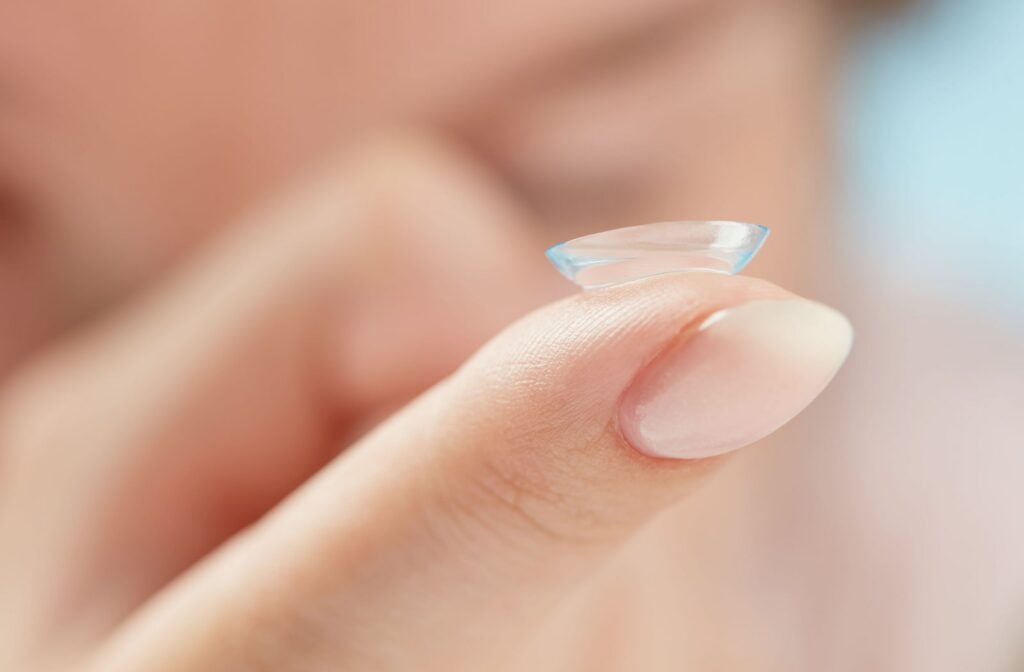 A close-up of a soft contact lens on the female fingertip. And in more mild cases of dry eye, soft contact lenses are sometimes suitable