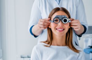 An adult patient undergoing a comprehensive eye exam with an optometrist.
